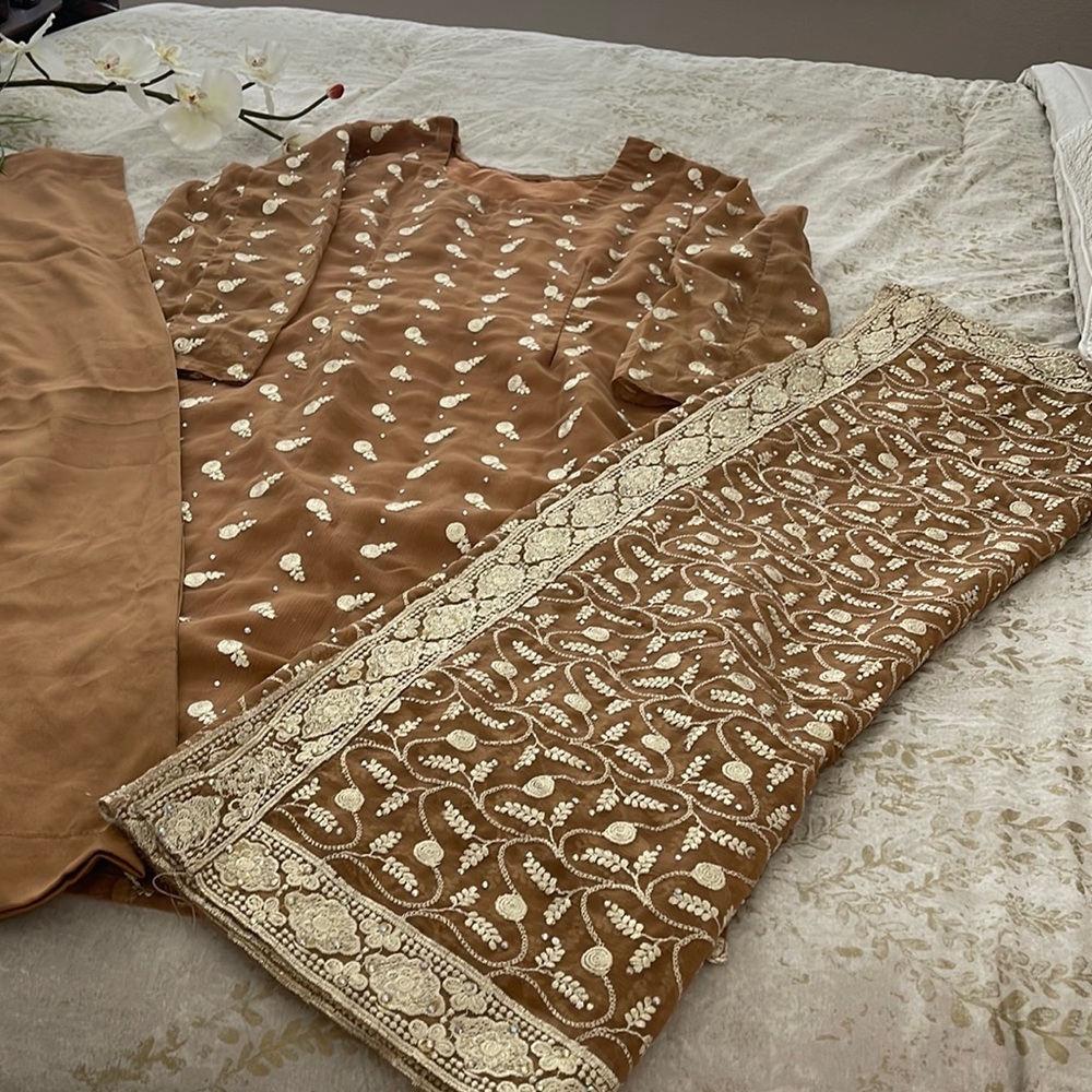Three piece Pakistani clothing